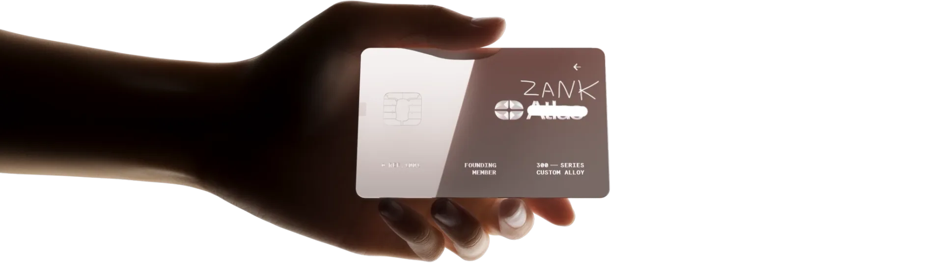 A hand holds the beautiful Zank Card - the super-mirror finish surface reflects the light